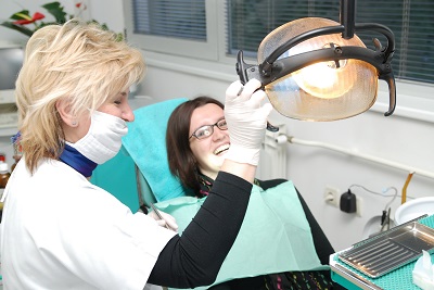 Dentist with patient