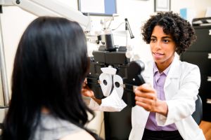 eye doctor giving eye exam